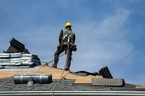 Professional Roofing technician working in Freehold, NJ
